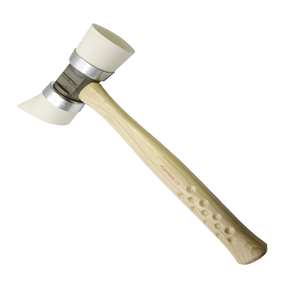 The 2AL WedgeHead mallet uses two soft white rubber caps; one a typical round head for striking the nailer, and the other, a WedgeHead™ cap that provides sufficient head angle and increased edge clearance for racking flooring strips.