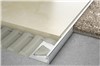 Schluter-SCHIENE provides effective and attractive edge protection for tile coverings that are typically bordered by carpet, at expansion joints, or as decorative edging for stairs. The profile offers a discreet, minimum reveal which is ideal for creating elegant transitions between floor coverings.