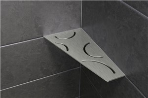 Schluter-SHELF-E is a wall storage system available in brushed stainless steel. The shelves are 5/32? (4 mm) -thick and feature designs coordinating with the Curve and Floral styles found in KERDI-DRAIN and KERDI-LINE drain grates. They can be used in showers and other tiled wall applications (e.g., kitchens and baths). SHELF-E is suitable for corner installations and available in three different shapes. It features 3/32? (2 mm) -thick tabs that allow for installation with the tile or in retrofit applications.