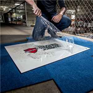 The Step n Peel Clean Mat is a polyethylene film mat with a sticky surface to remove dust and dirt from footwear. This unique product features a sturdy, reusable platform constructed of rigid polystyrene, available with a nonskid backing that holds it securely to floor surfaces such as carpeting, tile, concrete and more.