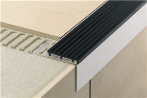 The Schluter-TREP-TAP is an anodized aluminum cover profile that integrates with the TREP-S and TREP-B stair-nosing profiles to conceal the top of the riser. Prevents tile edges on stairs from chipping. Increases safety by improving the visibility of stair edges. Ideal for offices, shopping malls, and other public areas. Available in satin anodized aluminum in two widths 2&quot; and 2-13/32&quot;. The cover profile in 2-13/32&quot; (61 mm) features a grooved surface, while the 2&quot;(50 mm) profile has a smooth surface.